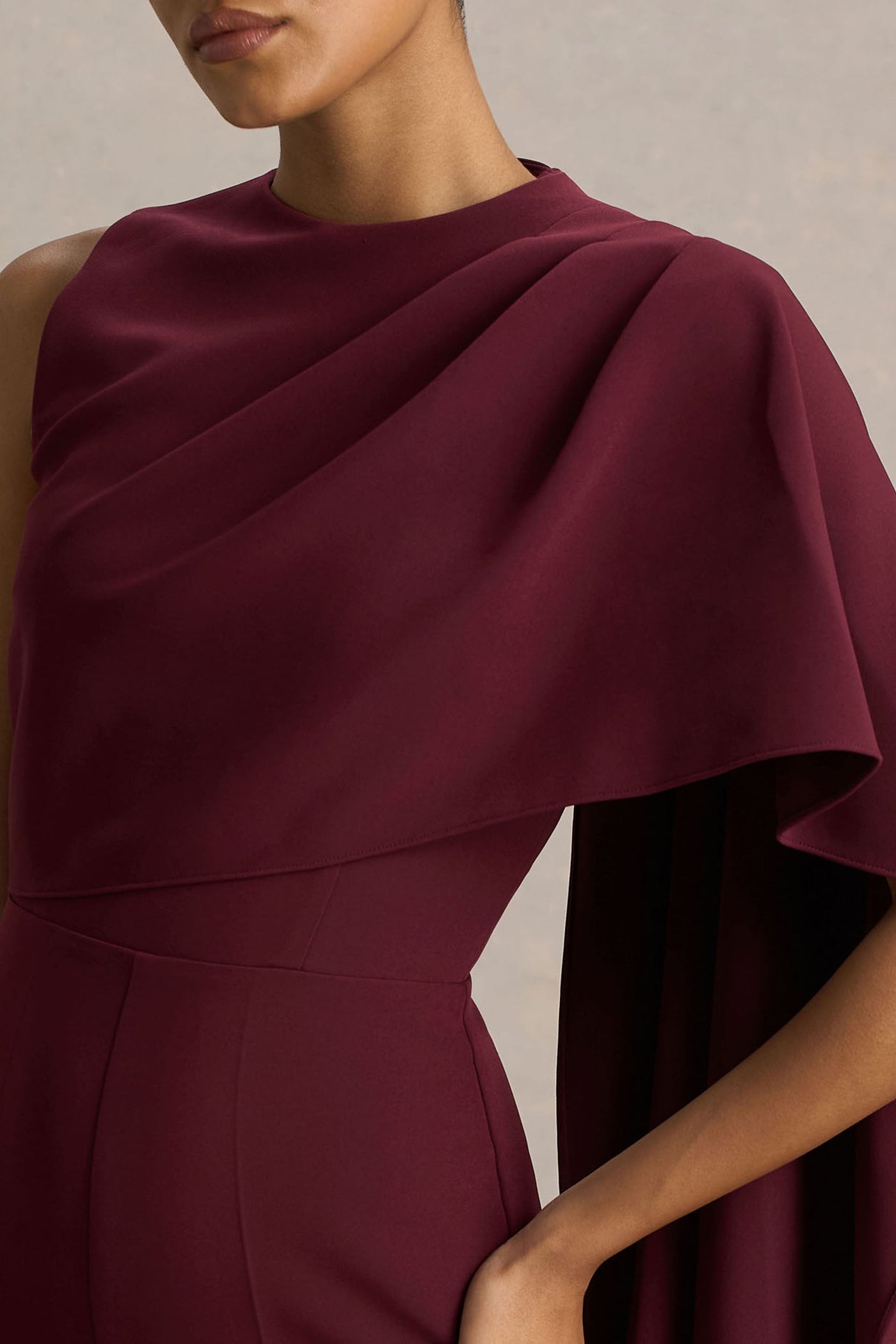 Sorenia | Burgundy High-Neck Jumpsuit With One-Cape Sleeve